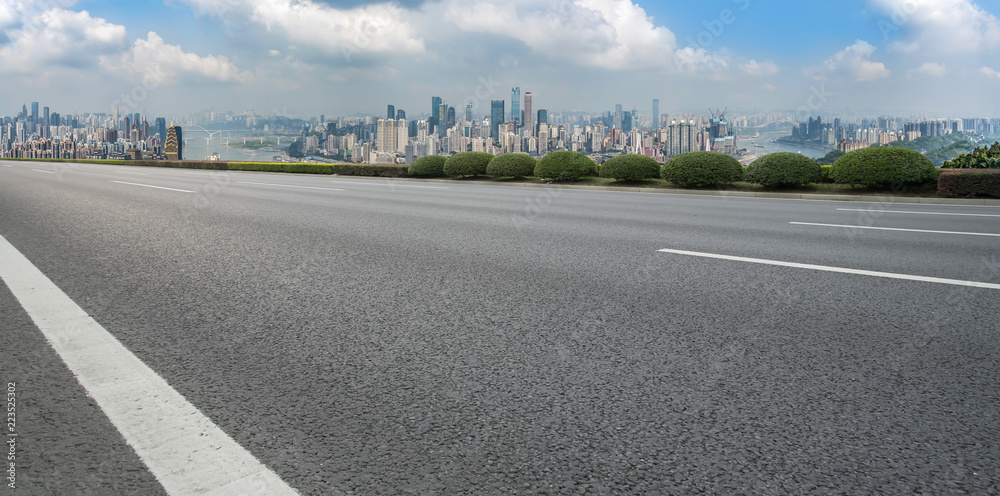 Road pavement and Chongqing urban architecture skyline