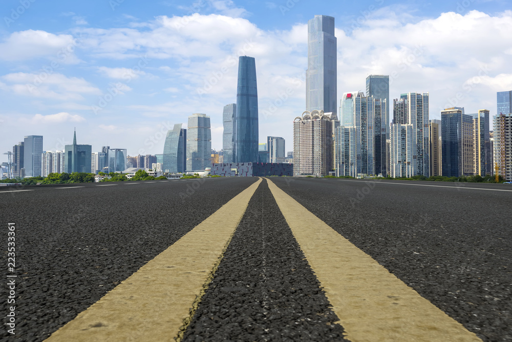 Road pavement and Guangzhou city buildings skyline