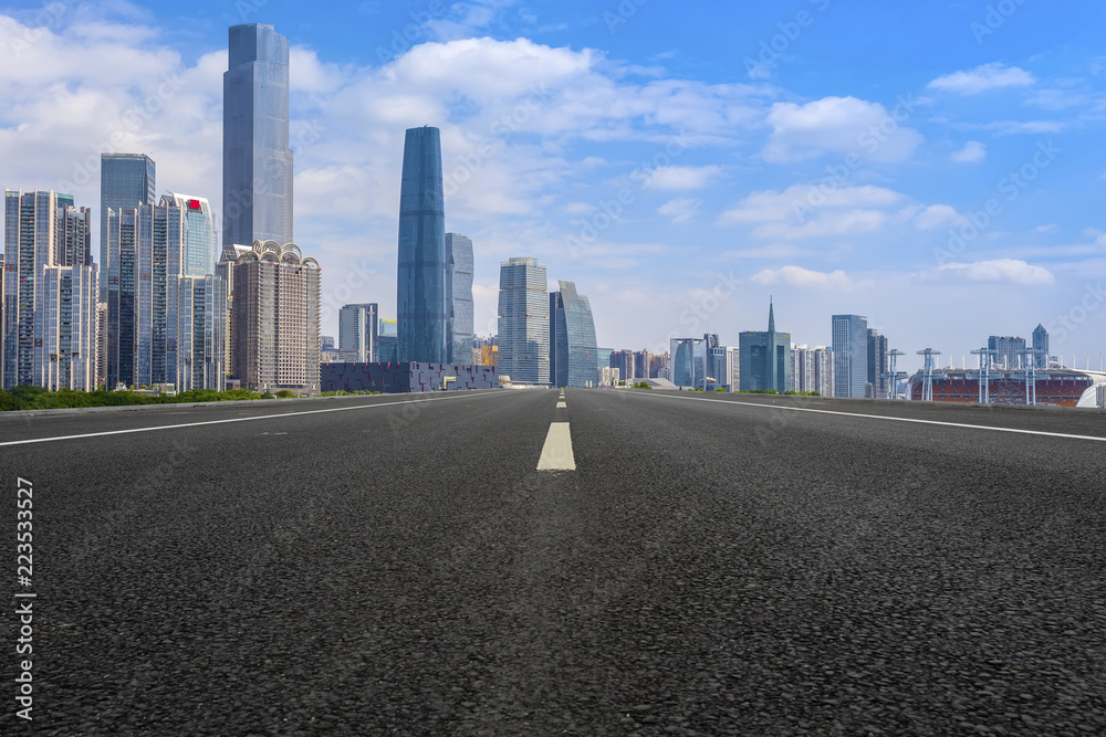 Road pavement and Guangzhou city buildings skyline