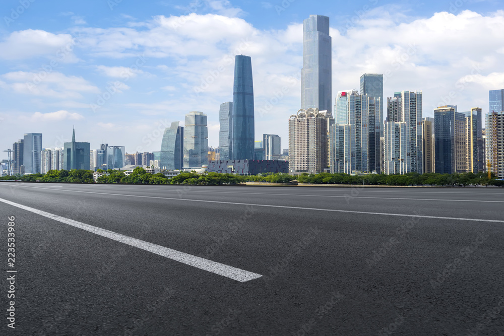 Road pavement and Guangzhou city buildings skyline