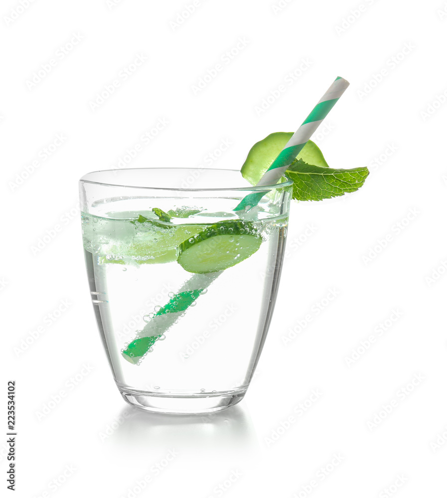 Glass of fresh cucumber water on white background