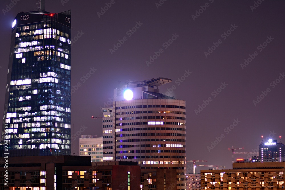 Night lights, city office building downtown, cityscape view.