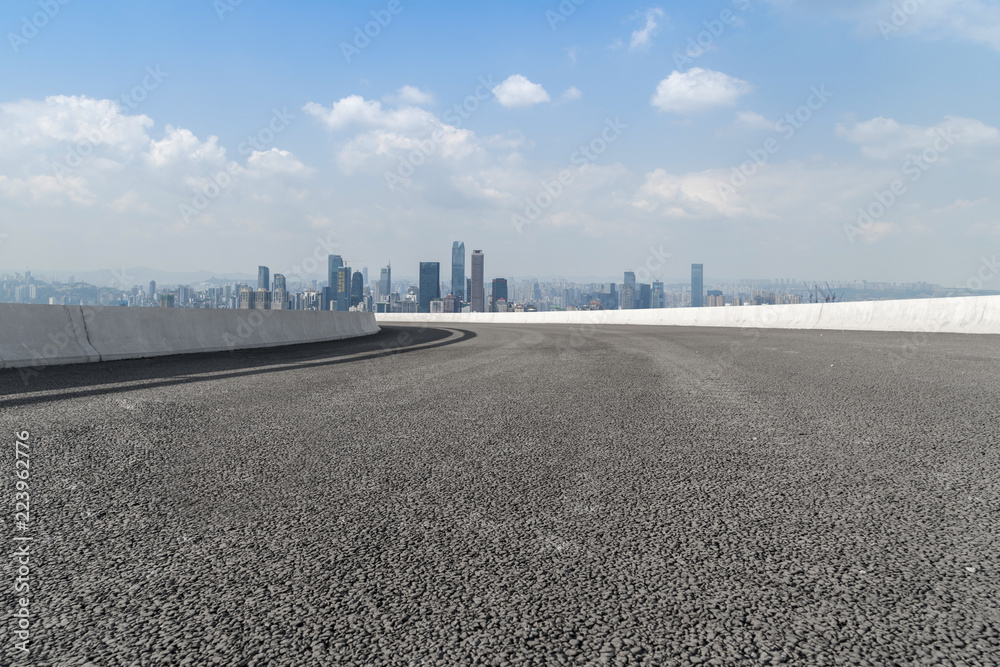 Road pavement and Chongqing urban architecture skyline