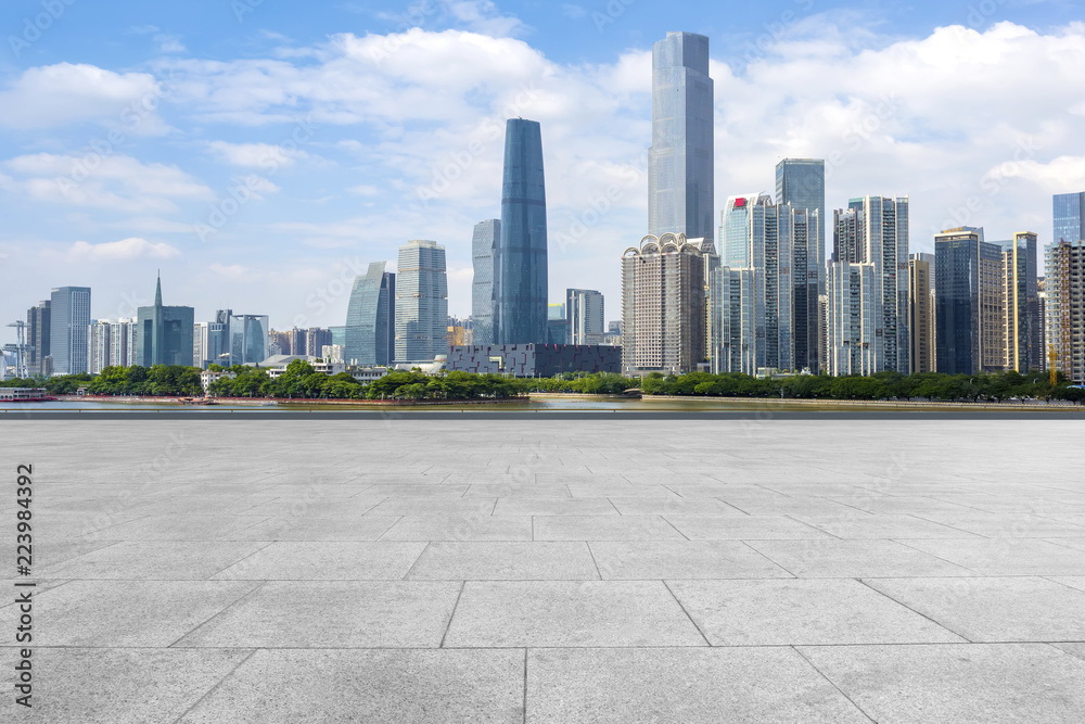 Urban skyscrapers with empty square floor tiles