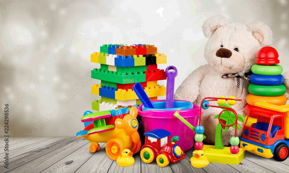 Composition of various toys on blurred background