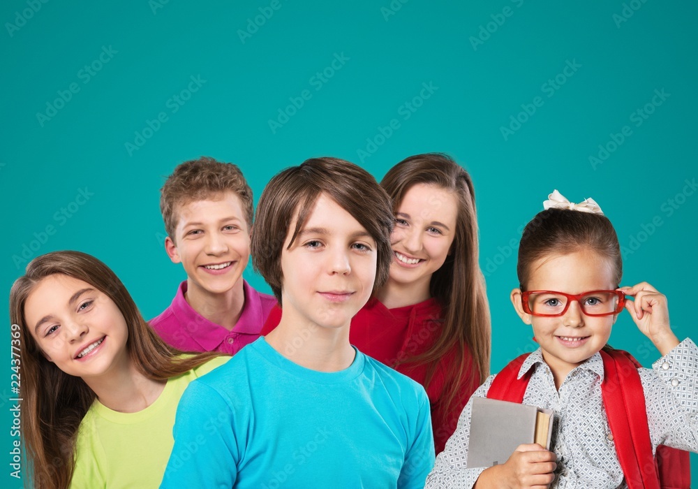 Friendly school children studying concept  on background