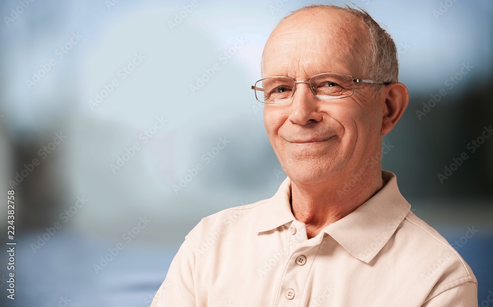 Portrait of senior man smiling at camera