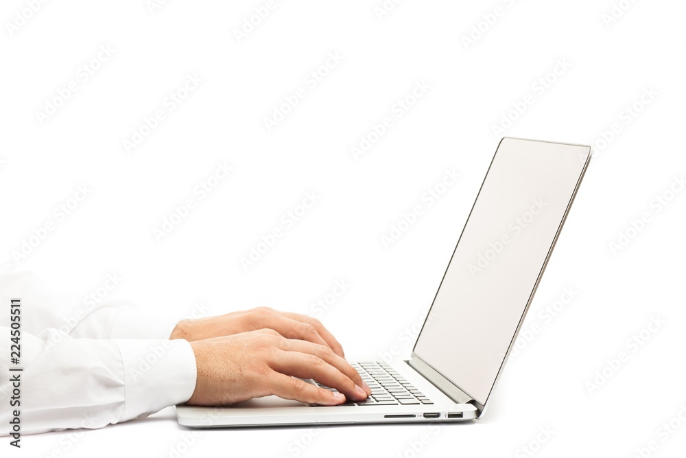 Closeup of a Businessman Typing on a Laptop