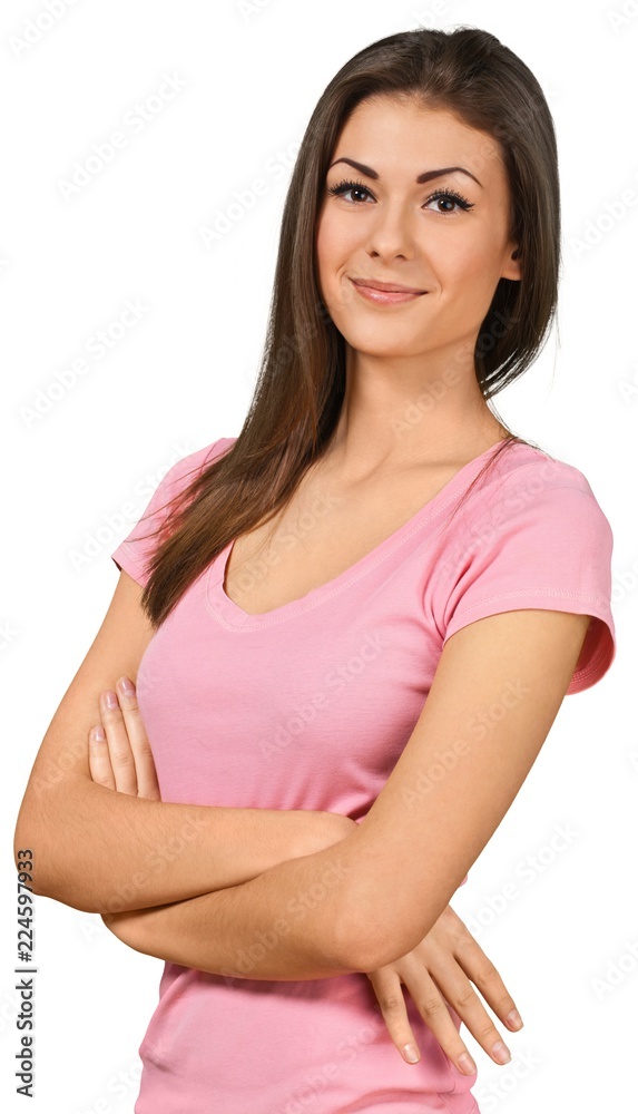 Friendly Young Woman Standing with Arms Folded - Isolated