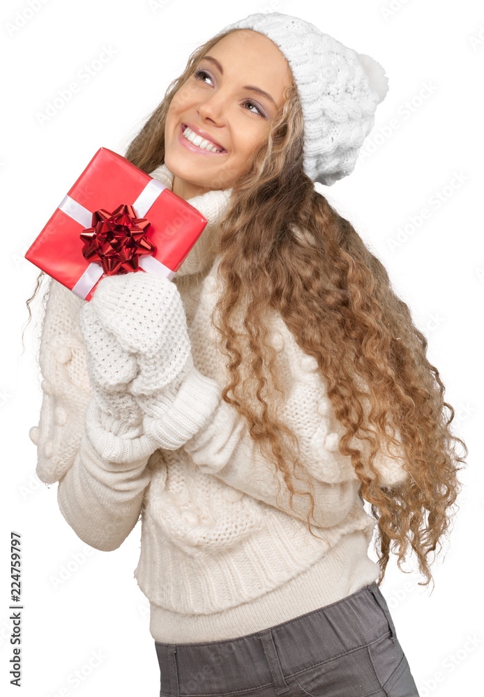 Young Woman In Winter Clothes Holding Present - Isolated