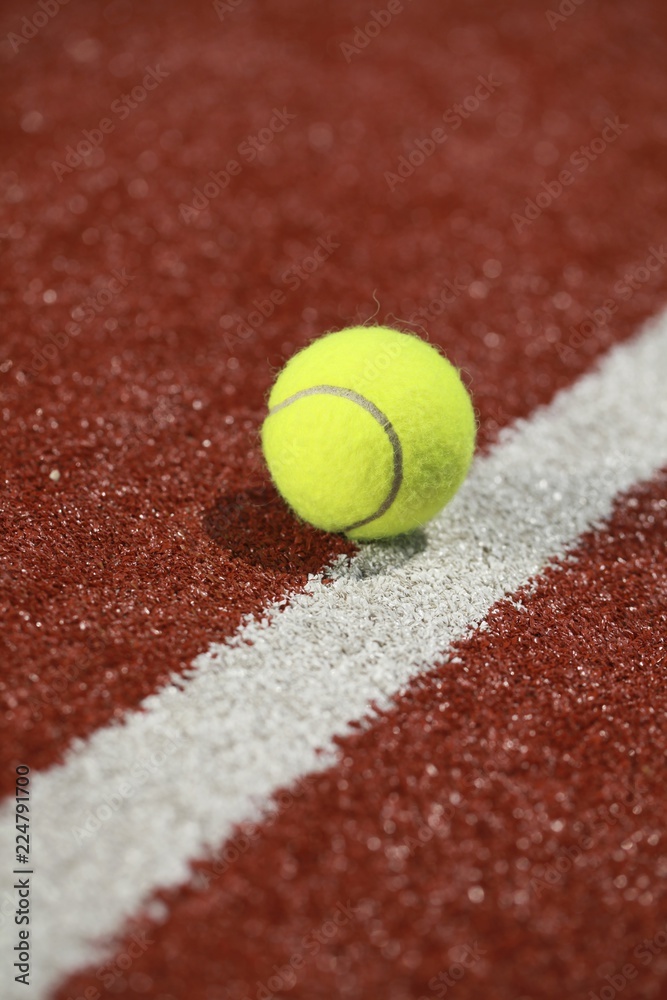 Tennis ball on a tennis court