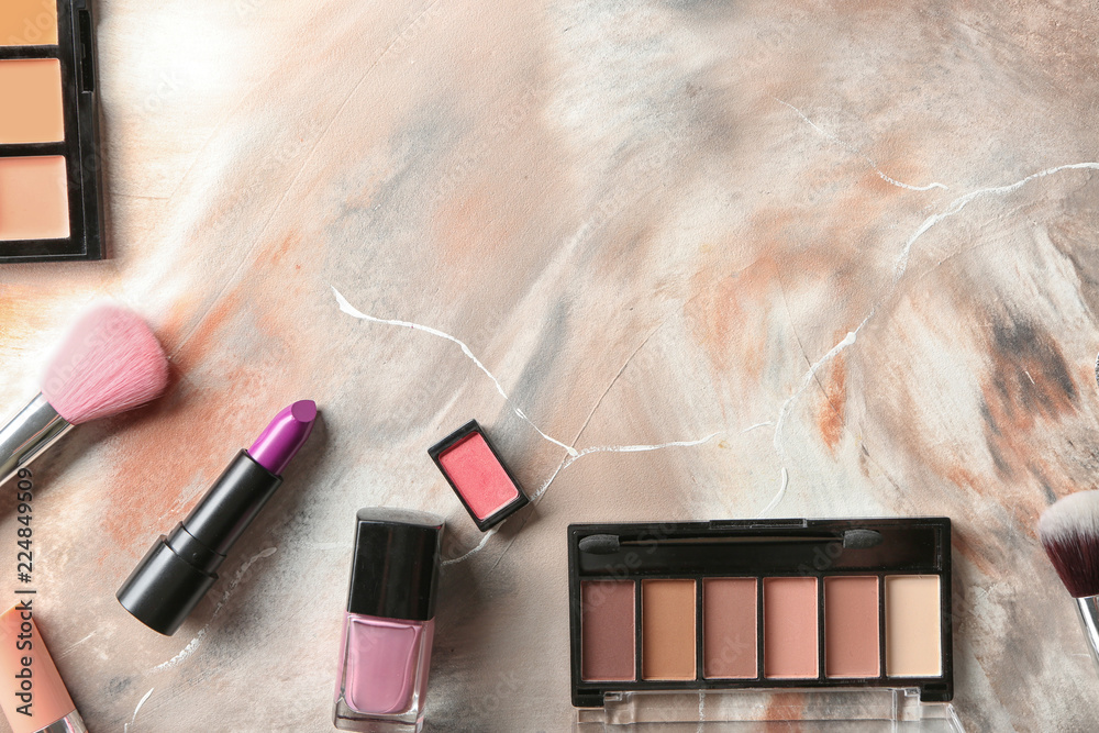 Flat lay composition with decorative cosmetics on marble background