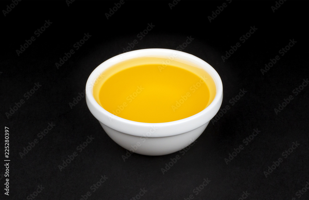 Vegetable oil in white bowl