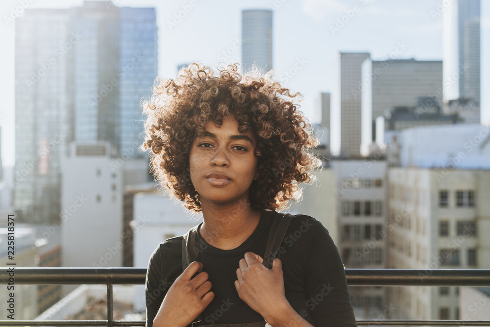 Girl with curly hair at a LA rooftop