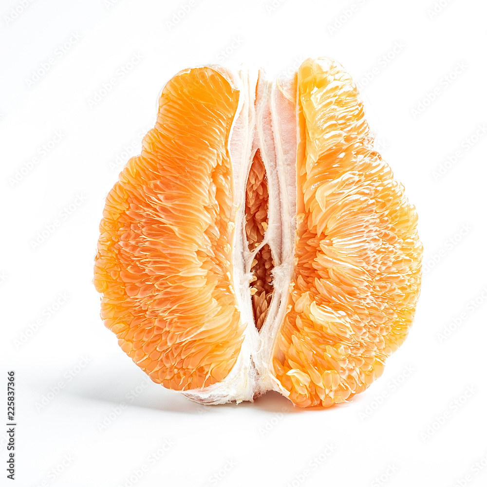 Golden grapefruit flesh on white background