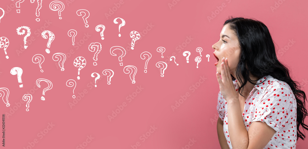 Question marks with young woman speaking on a pink background