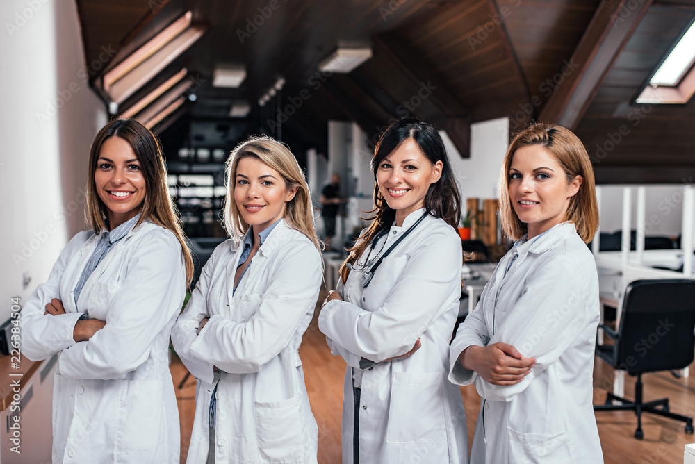 Group portrait of beautiful female medical team.