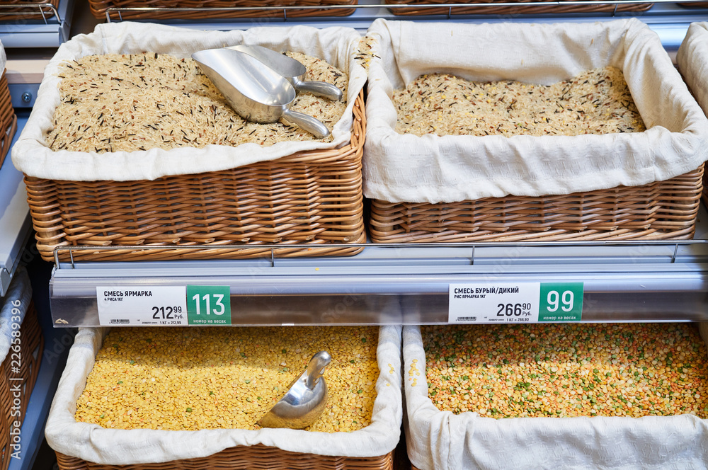 Variety of healthy grains and seeds in supermarket.