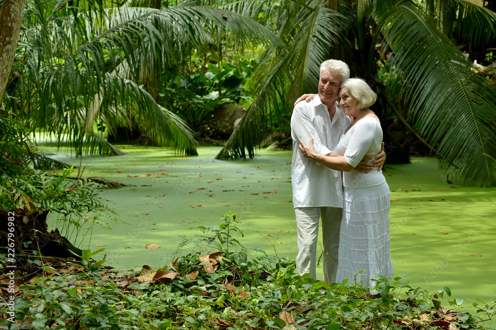 Portrait of a happy elderly couple hugging