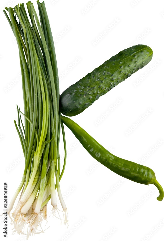 Close-up of fresh green vegetables isolated on white background