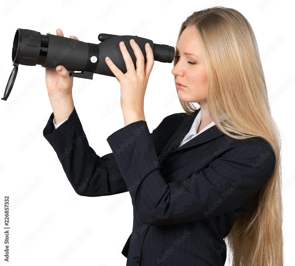 Young Businesswoman Looking Through Telescope - Isolated