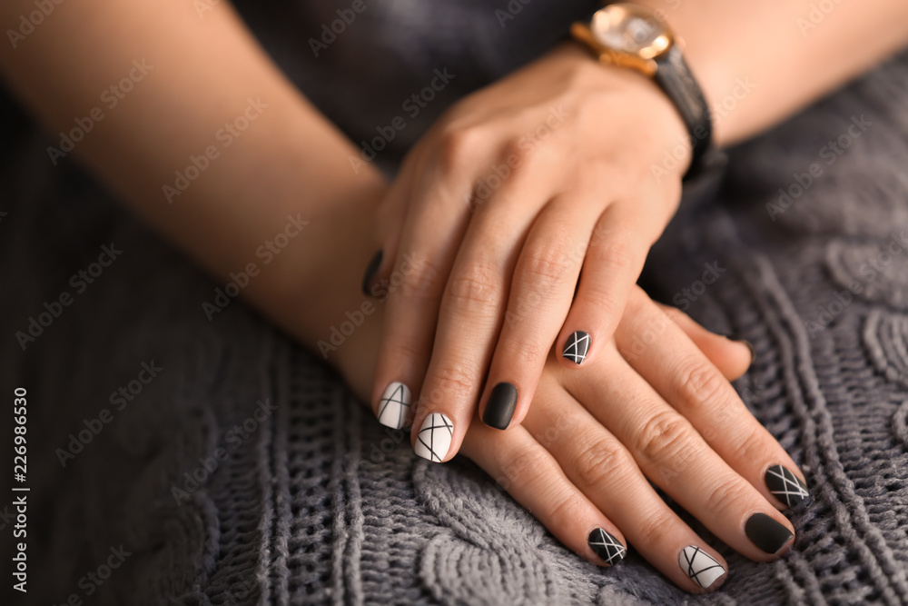 Woman with stylish beautiful manicure, closeup