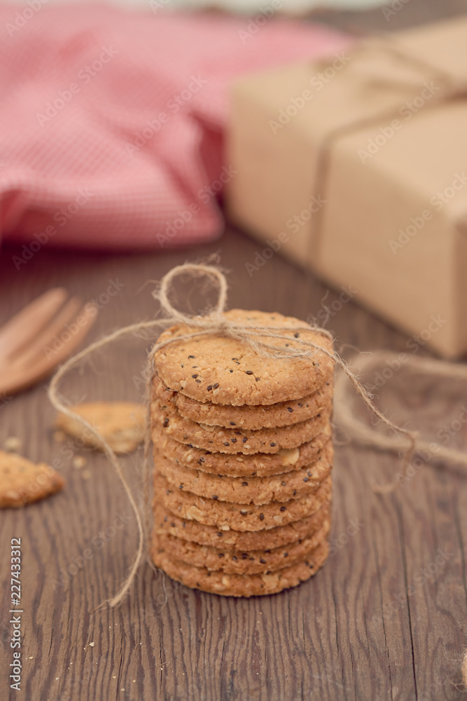 freshly baked chocolate chip cookies on rustic wooden table