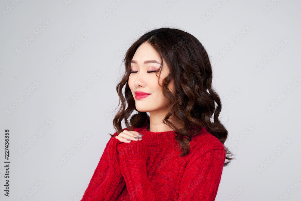 Charming asian young woman in winter clothing