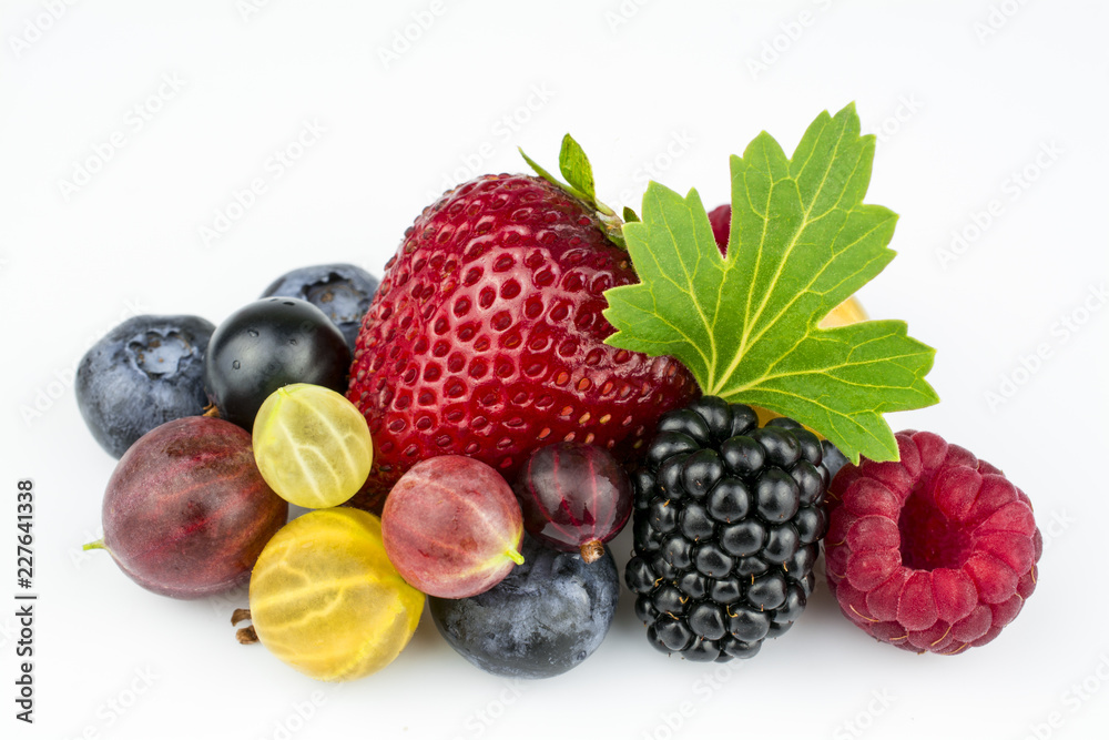 Mixed berries isolated on a white background by close up.