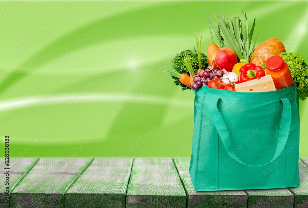 Full shopping  bag, isolated over background