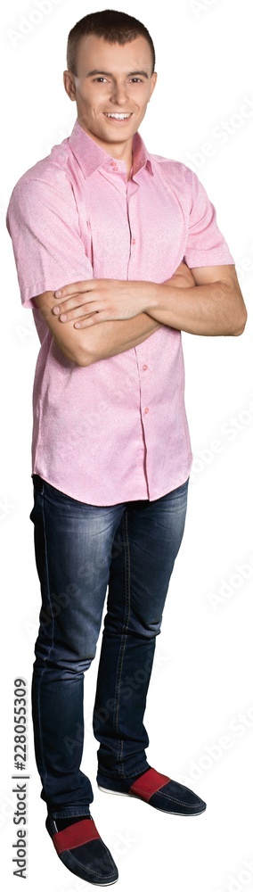 Handsome and Happy Man Standing with Crossed Arms - Isolated