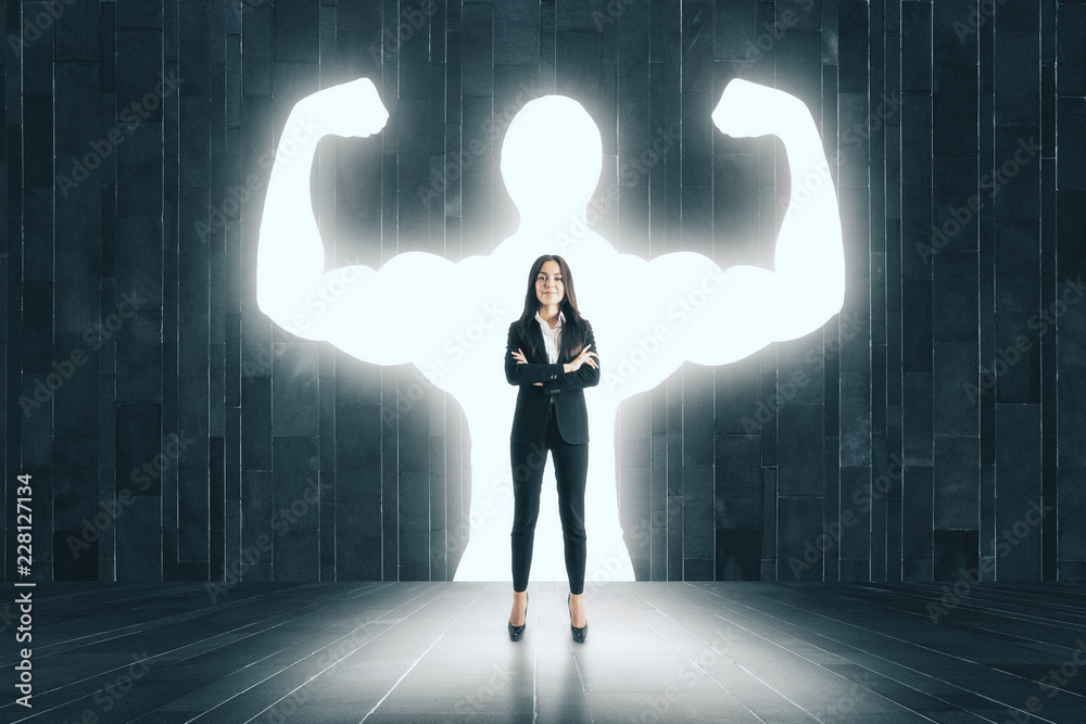 Businesswoman with muscly arms