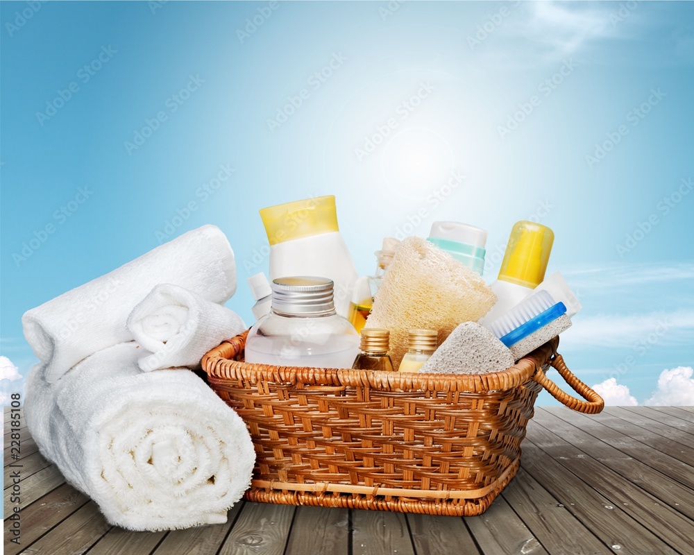 Bath towels and basket with accessories for