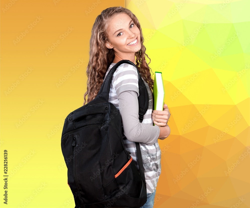 Beautiful female student with backpack