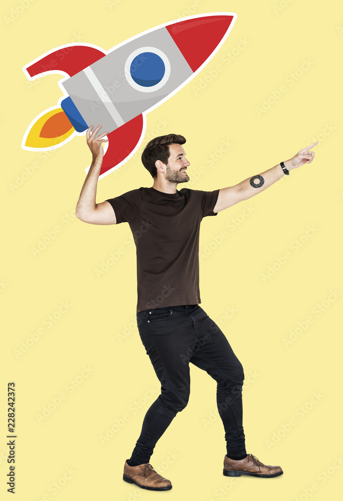 Cheerful man with launching rocket symbol