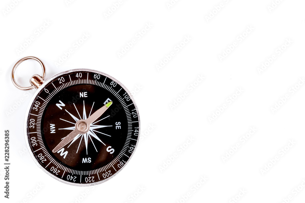 compass on white background concept - direction motion top view