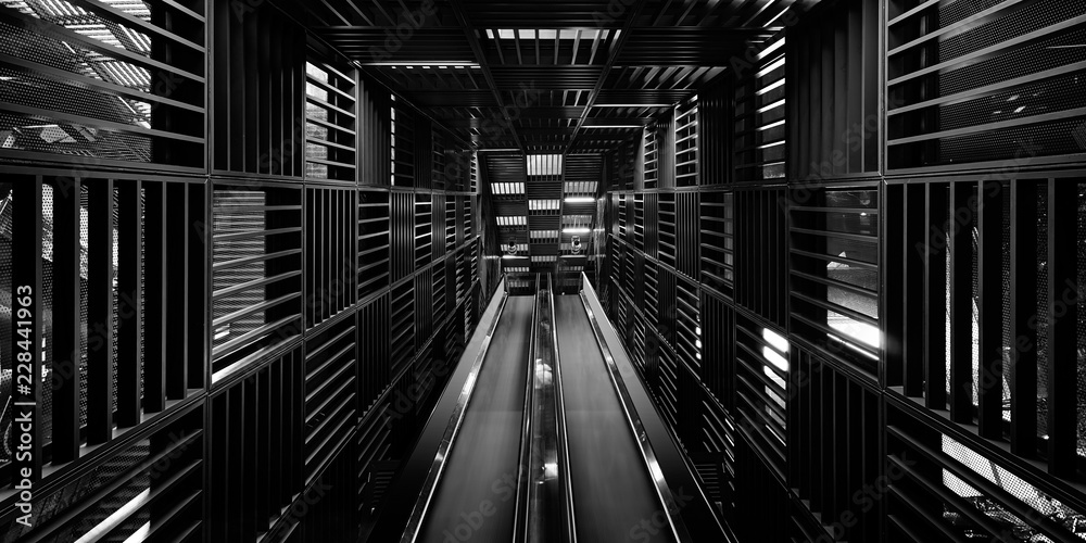 Abstract Black and White close up detail view mechanical escalator