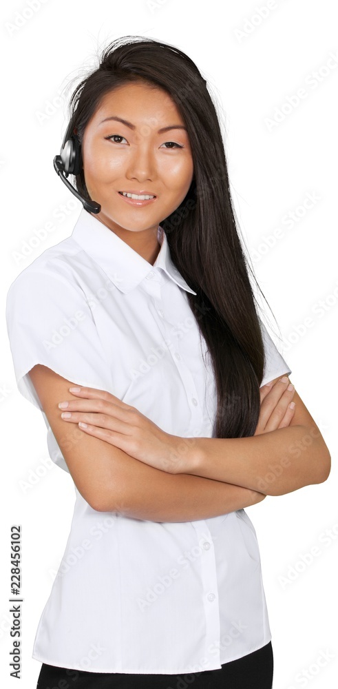 Friendly Asian Woman with Arms Crossed Talking on Headset -