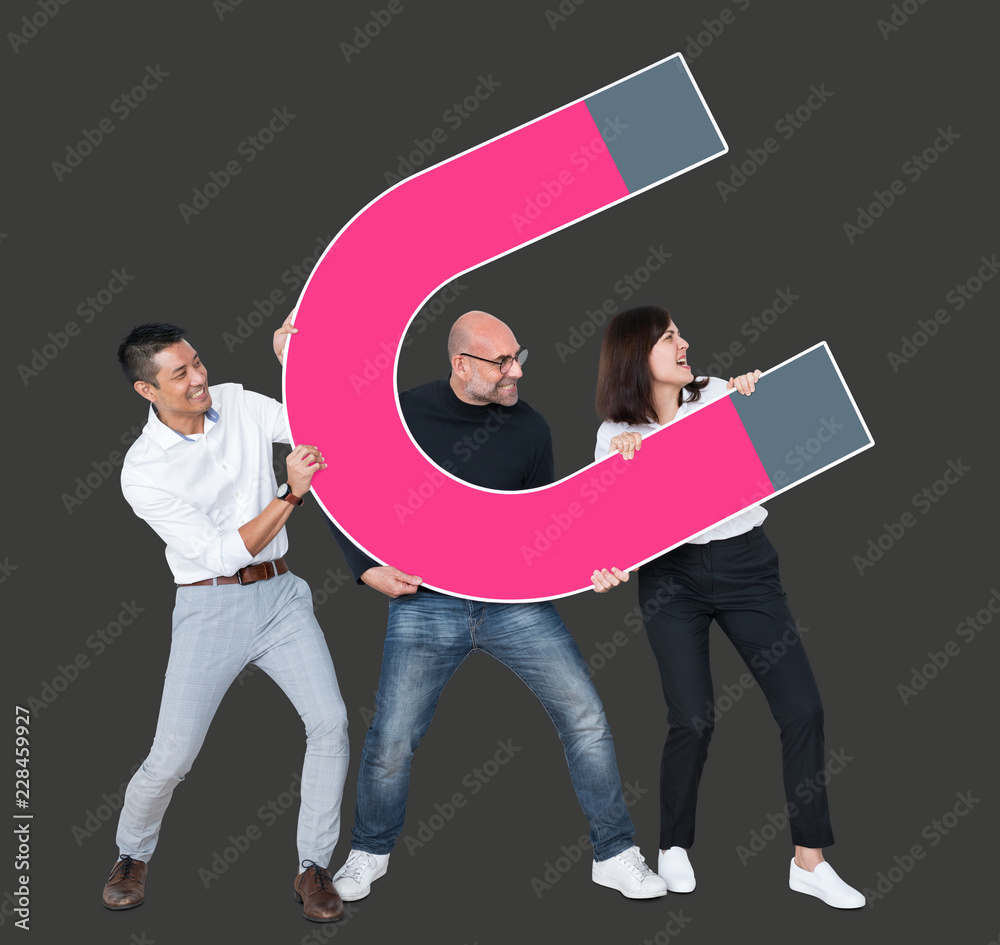 Business team with a large magnet