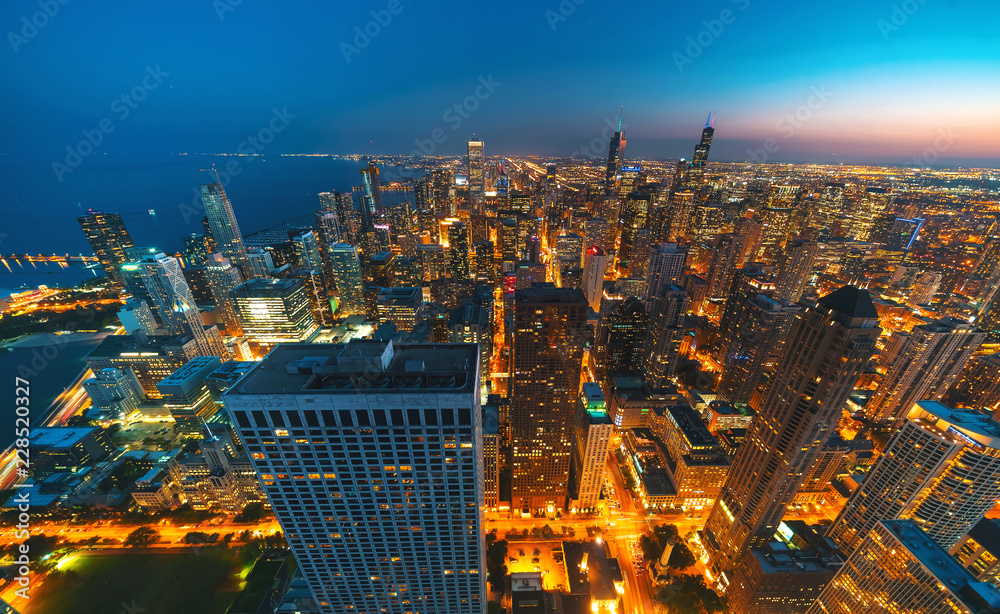 Chicago cityscape skyscrapers at night aerial view