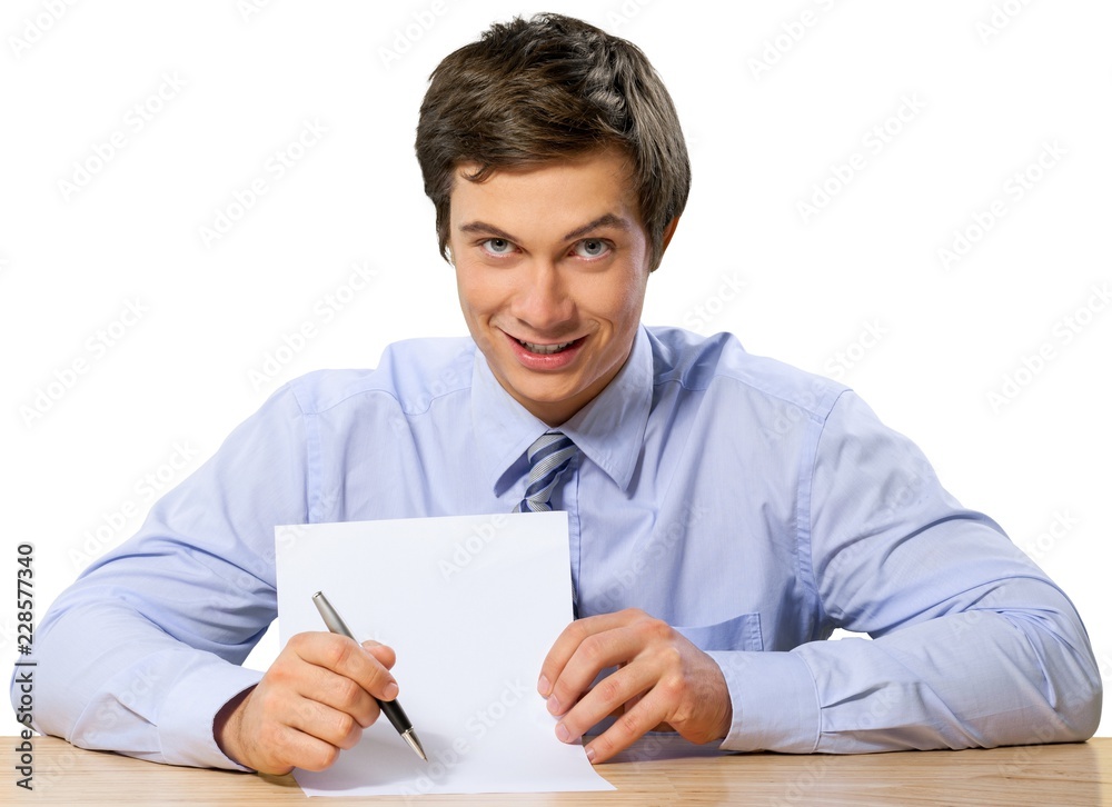 Friendly Businessman Sitting at the Desk - Isolated