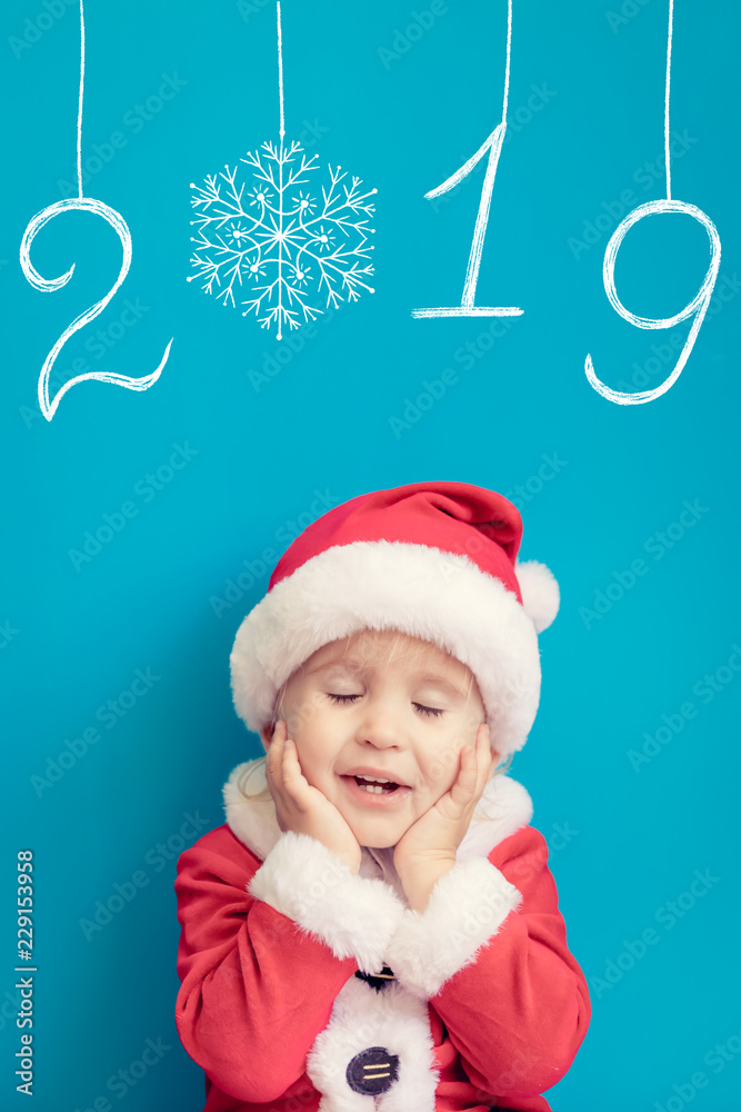 Portrait of baby wearing Santa Claus costume