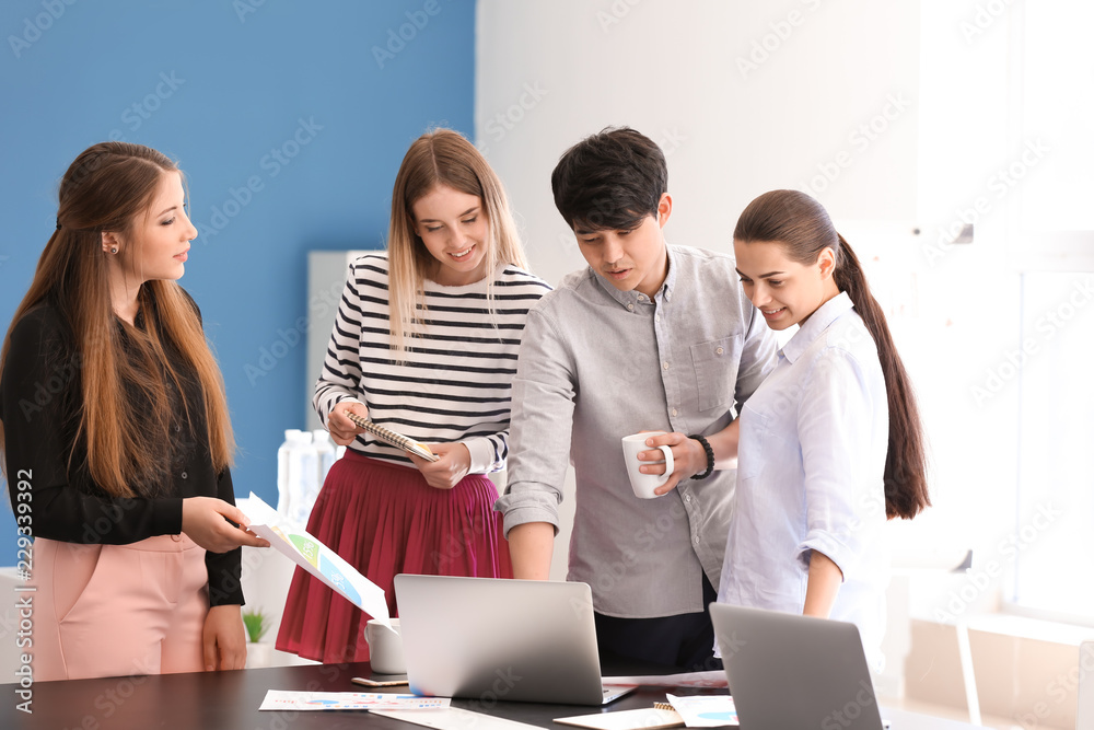 Meeting of business team working in office