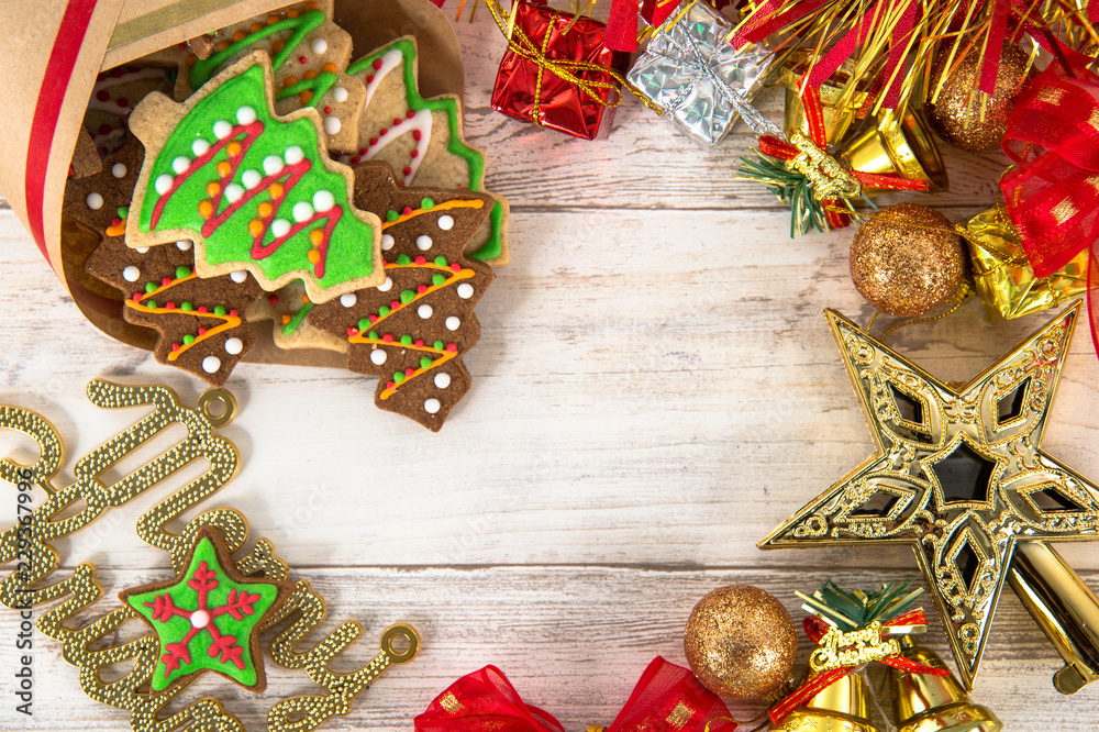 Beautiful Christmas composition and decoration with baked Christmas gingerbread cookie in paper bag 