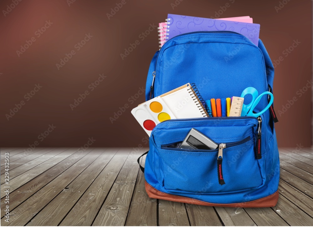 School Backpack with stationery, close-up view