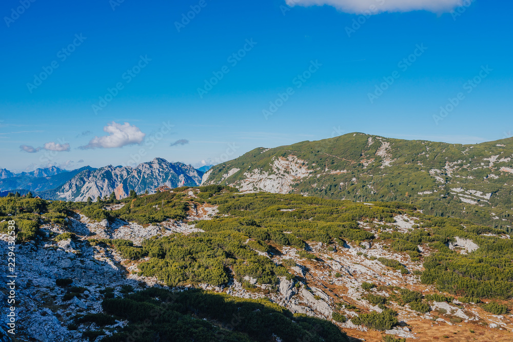 Summer alpine landscape around Dachstein, Austria. High alpine views, blue sky, summer hiking in the