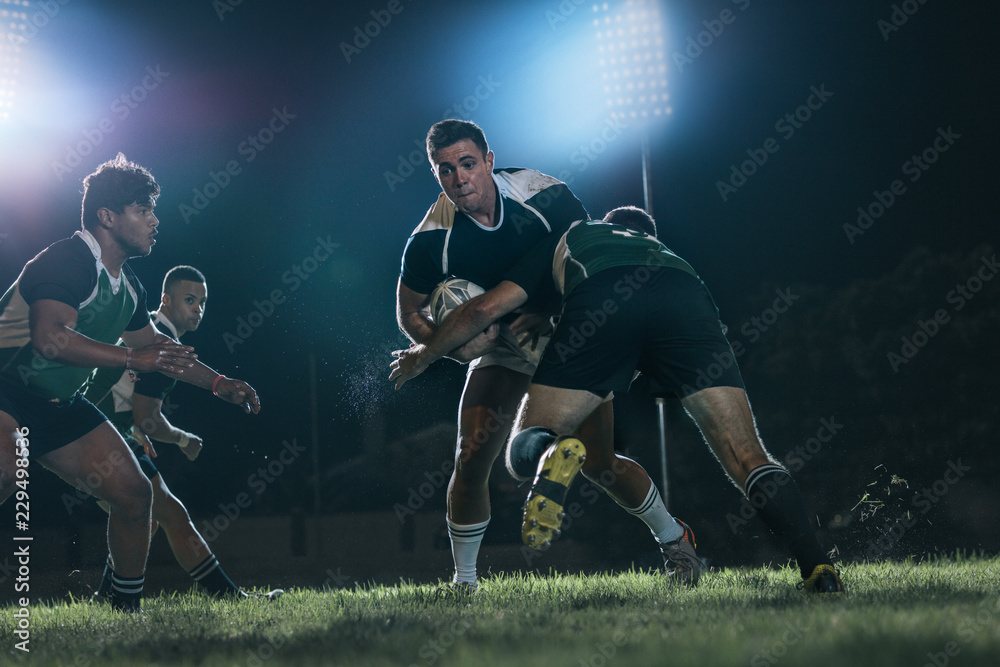 Intense rugby action at sports arena