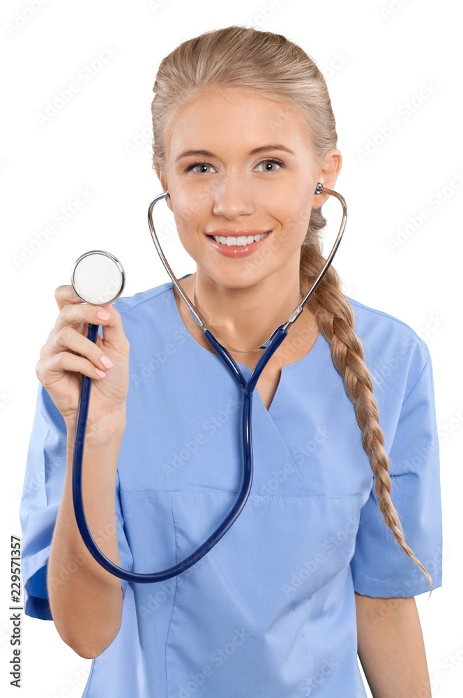 Beautiful young female nurse holding stethoscope