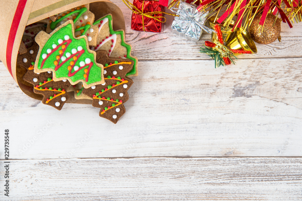 Beautiful Christmas composition and decoration with baked Christmas gingerbread cookies in paper bag