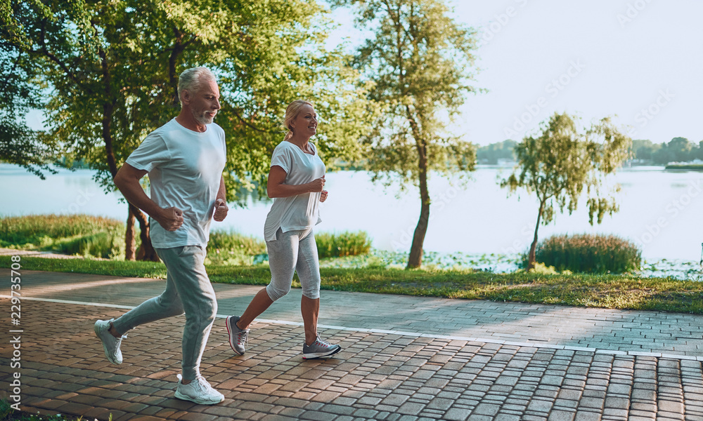 Senior couple doing sport outdoors